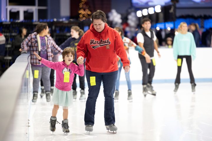 a group of people walking on the court