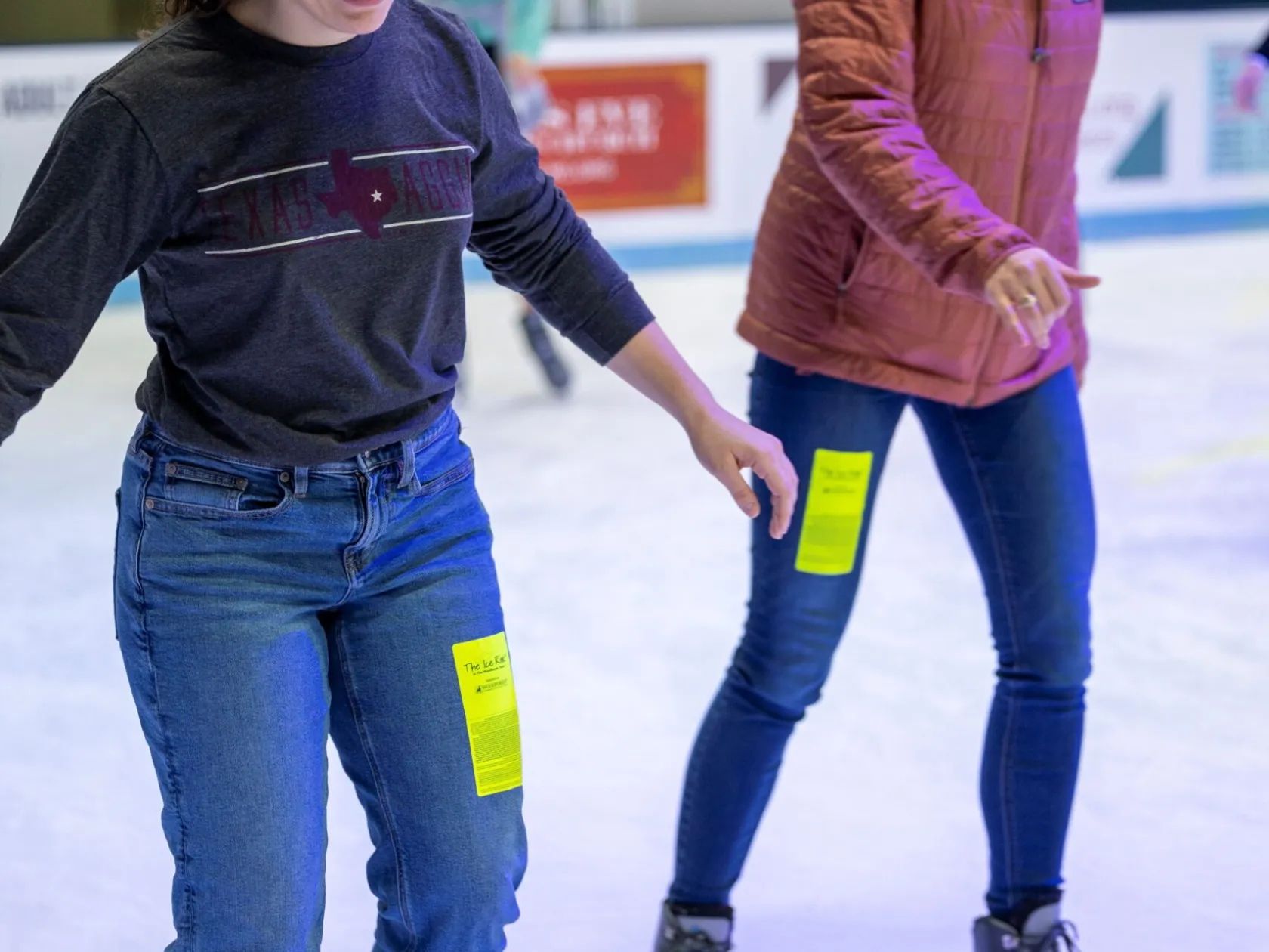 a little girl that is standing in the snow